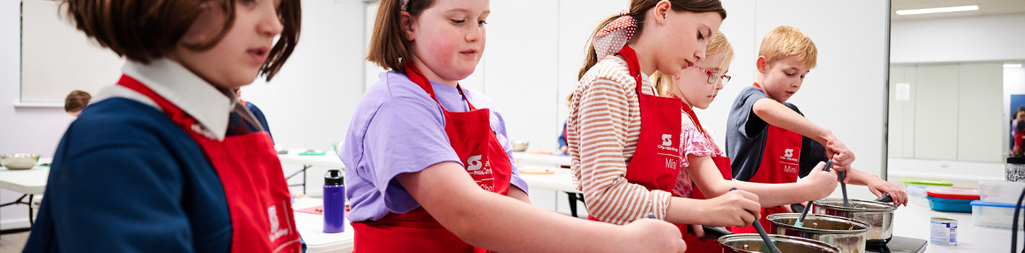 Children enjoying mini chef classes at Stirling Leisure 